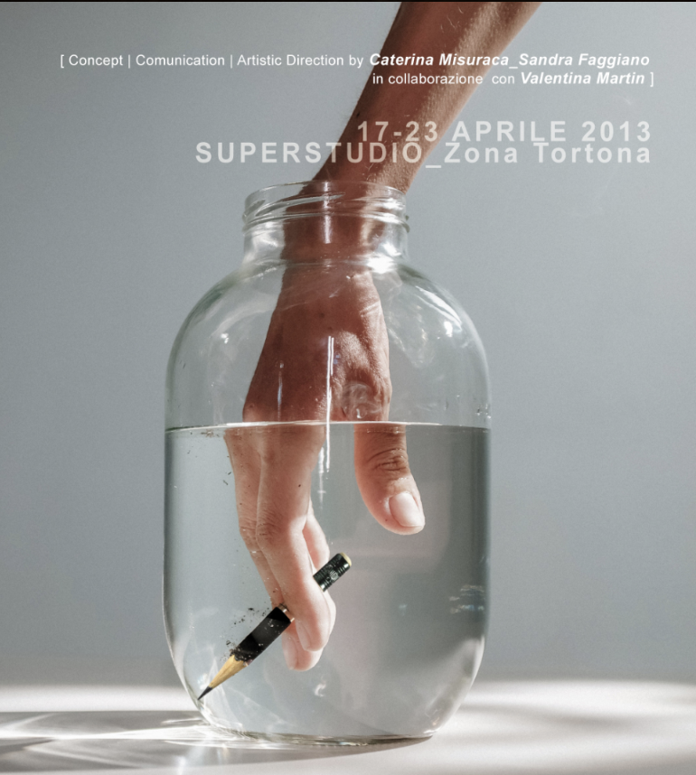 Estetica Fluida, Milano Design Week 2023: poster with a hand dipping a pen into a jar of water