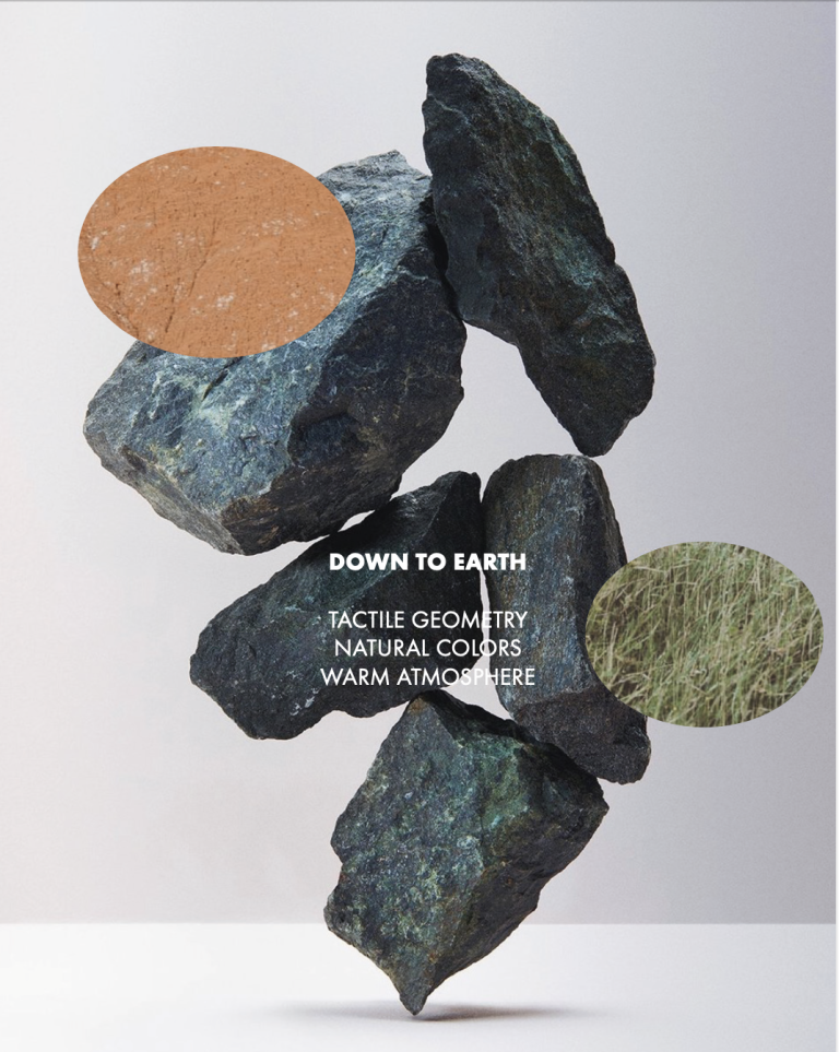 Cover of the Baboon Down to Earth wallpaper collection: stacked stones with the words tactile geometry, natural colors, warm atmosphere.