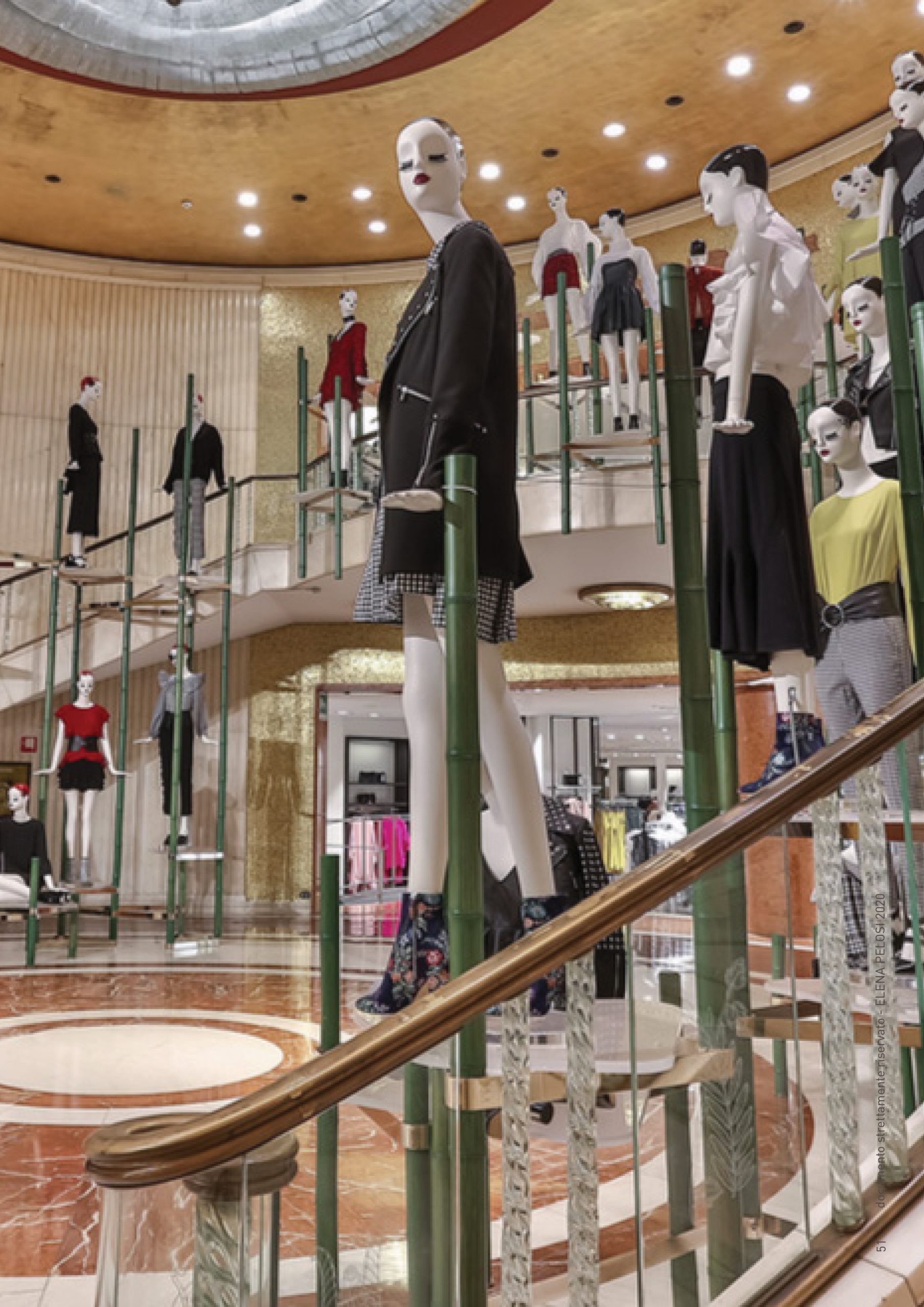 Arc de Triomphe for Zara: mannequins on the staircase installation beneath the store's rotunda
