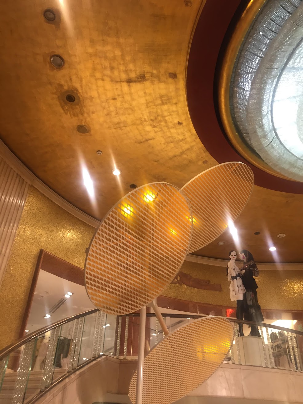 Milano Design Week installation for Zara: perforated metal discs suspended under the store's dome