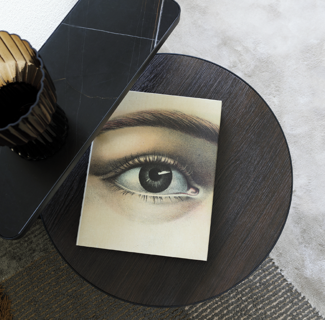 Showroom for Capital Interiors: photograph of an eye on a round dark side table