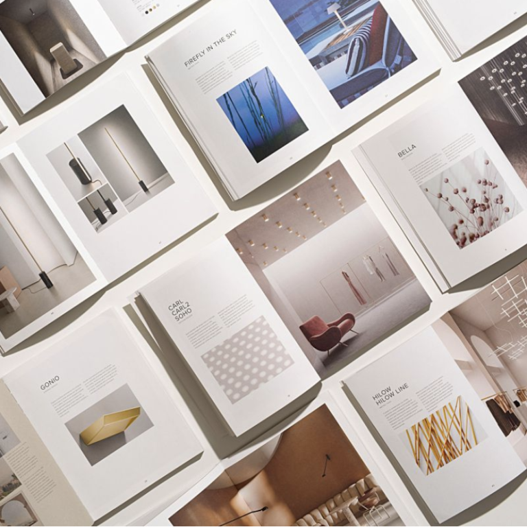 Open spreads of the Panzeri lighting catalogue showing lamps and interiors.