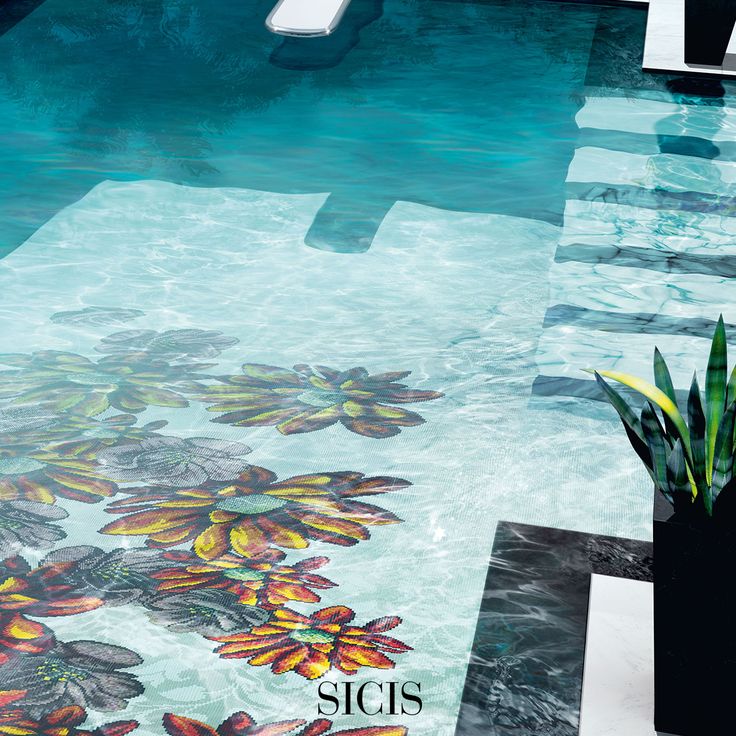 SICIS locations: pool floor with a floral glass mosaic seen through the water