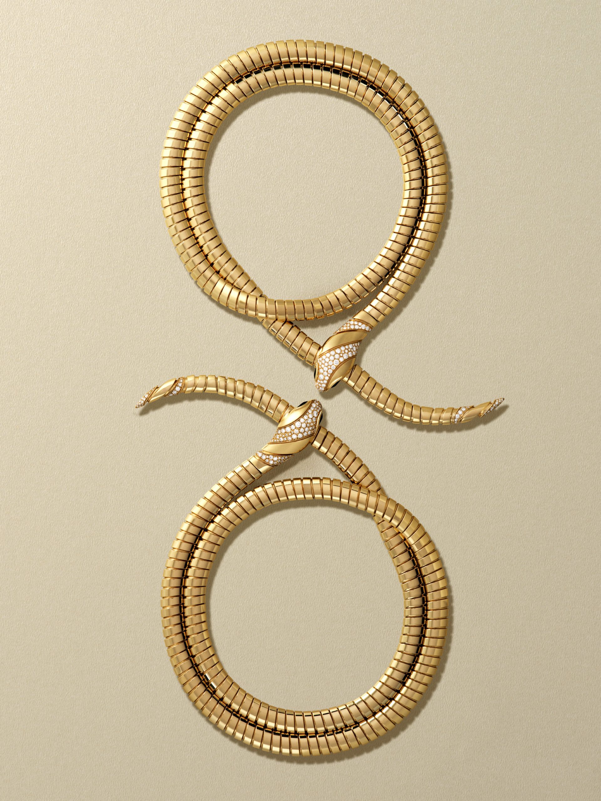 Bulgari Serpenti frames for Harper's Bazaar: Serpenti necklace shaped into two loops