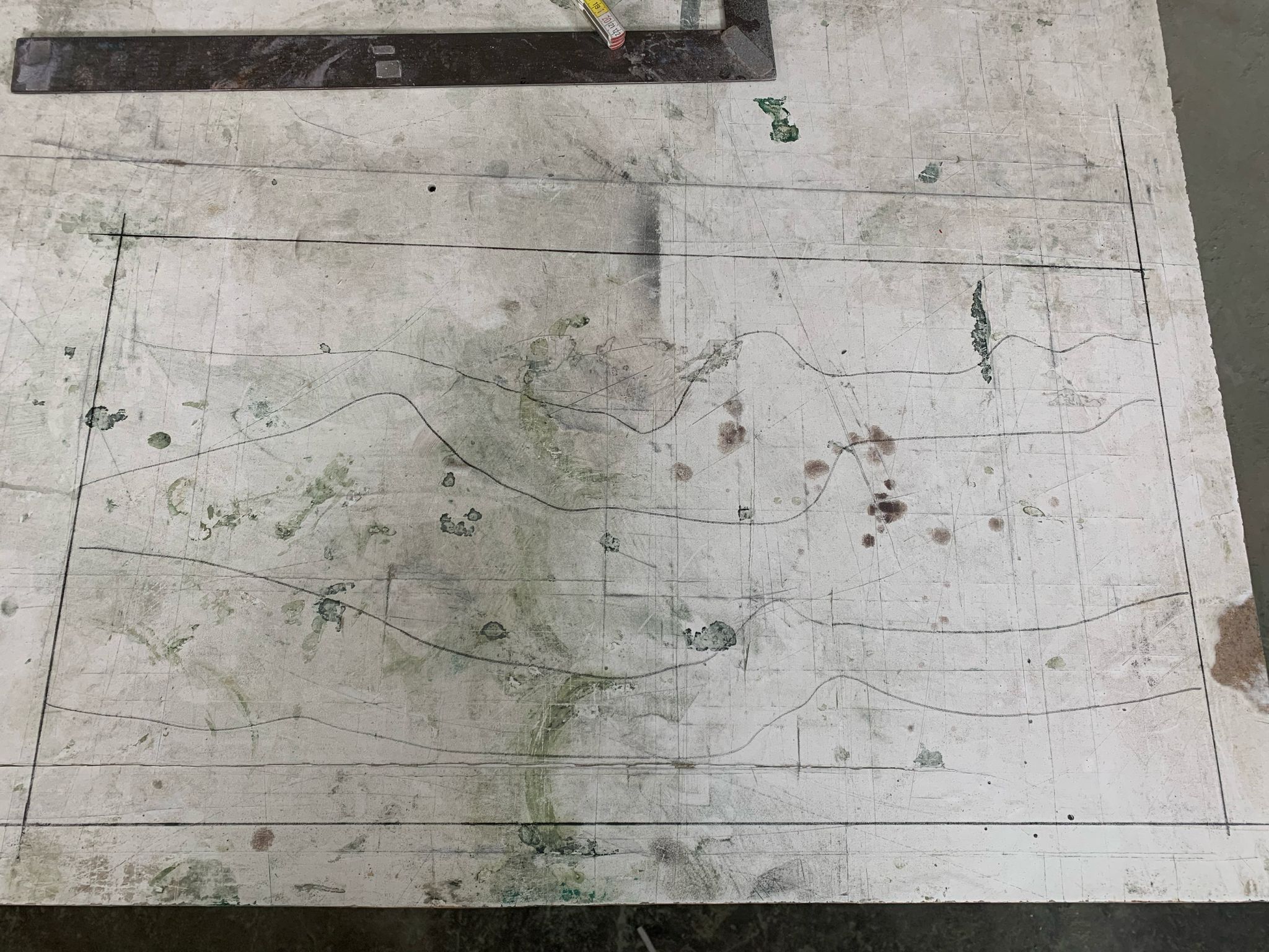 Stratigrafica collection: marked-up slab on the workshop table