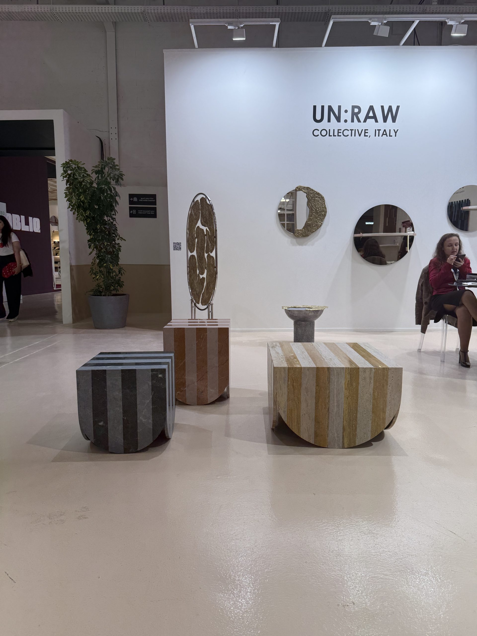 UN:RAW Collective, Downtown Design Riyadh 2025: the UN:RAW stand with tables, mirrors and sculptures
