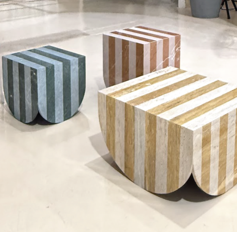 UN:RAW Collective, Downtown Design Riyadh 2025: striped marble Capri tables on the stand floor