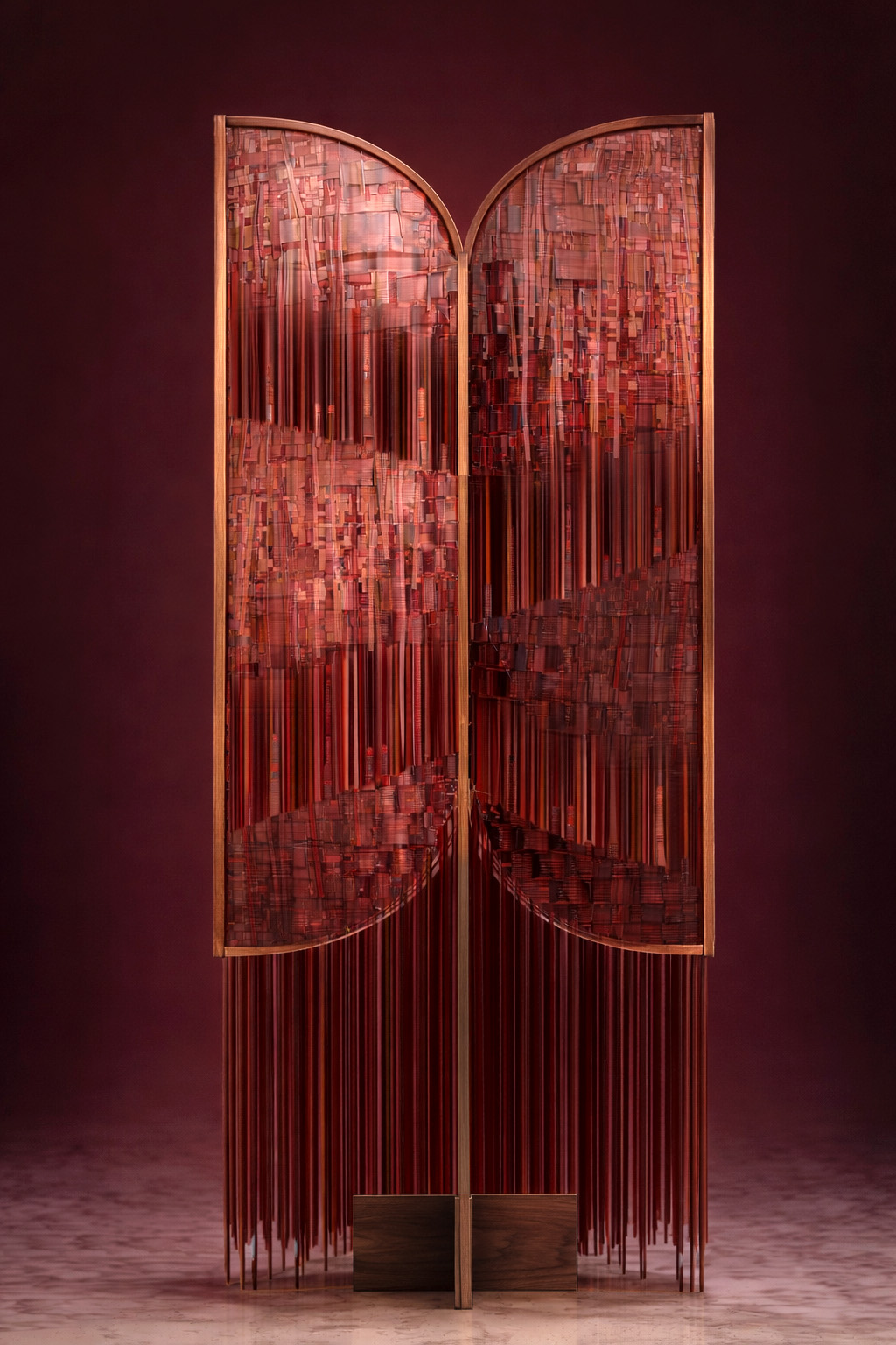The Dancing Queen screen: two arched panels with copper fringes and woven elements