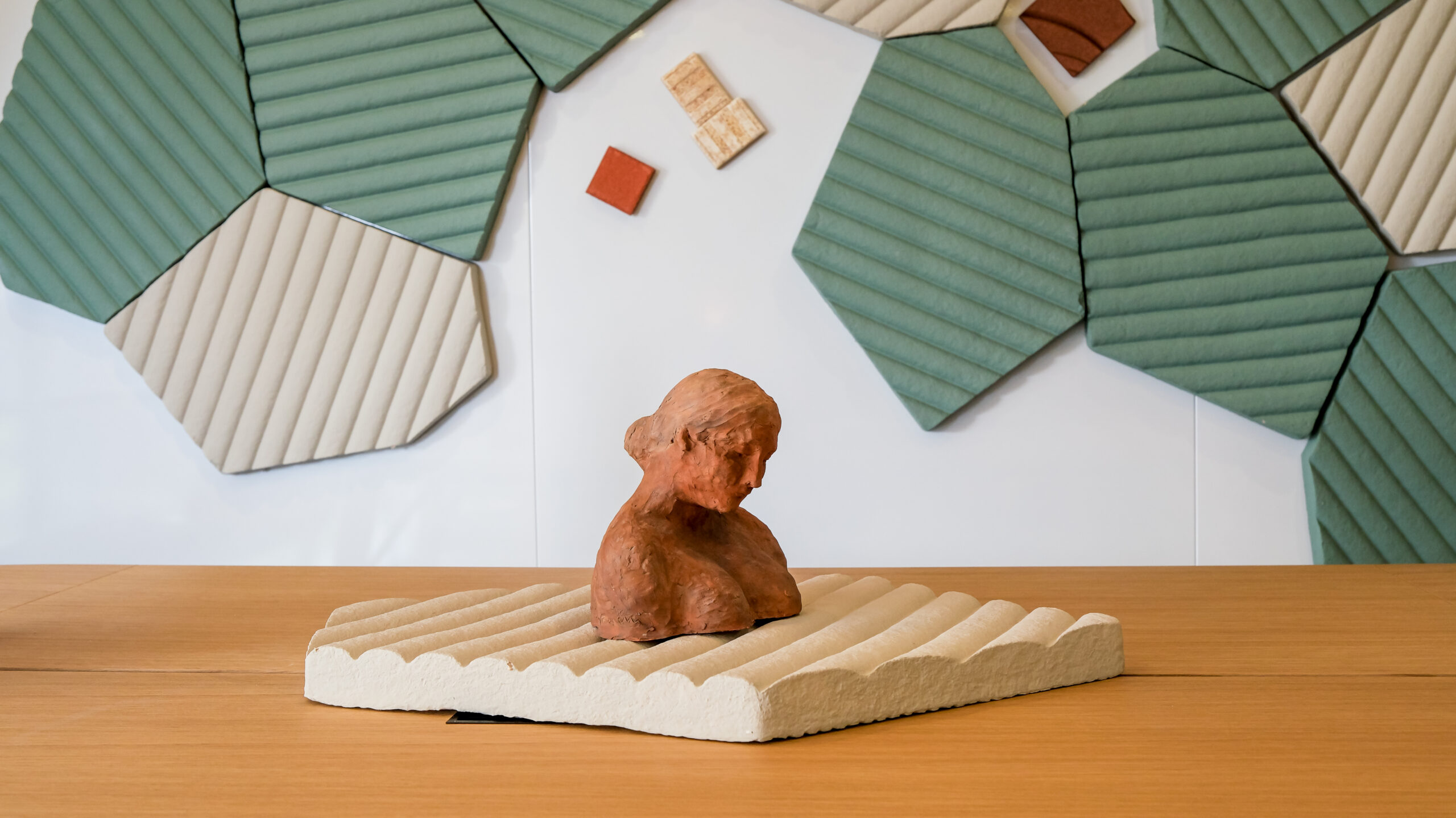 Stella 33 Milano: Elena Pelosi at Fuorisalone 2026, hexagonal ceramic tiles and a terracotta figure
